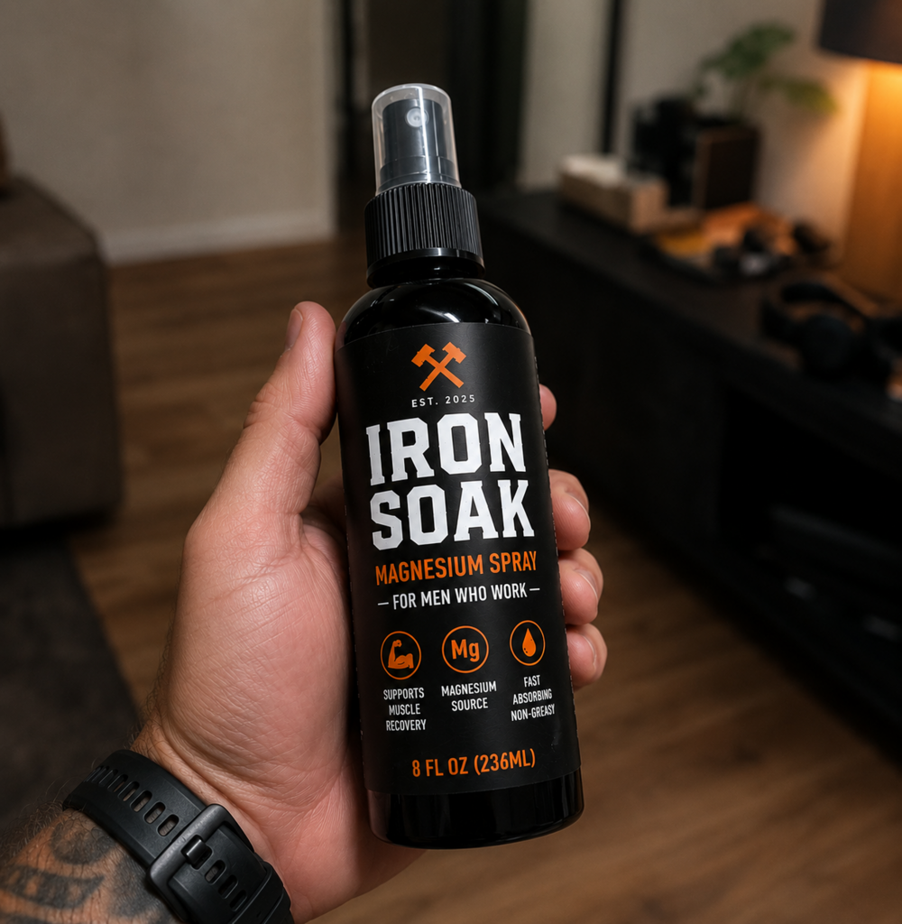 Jake D. holding Iron Soak magnesium spray
